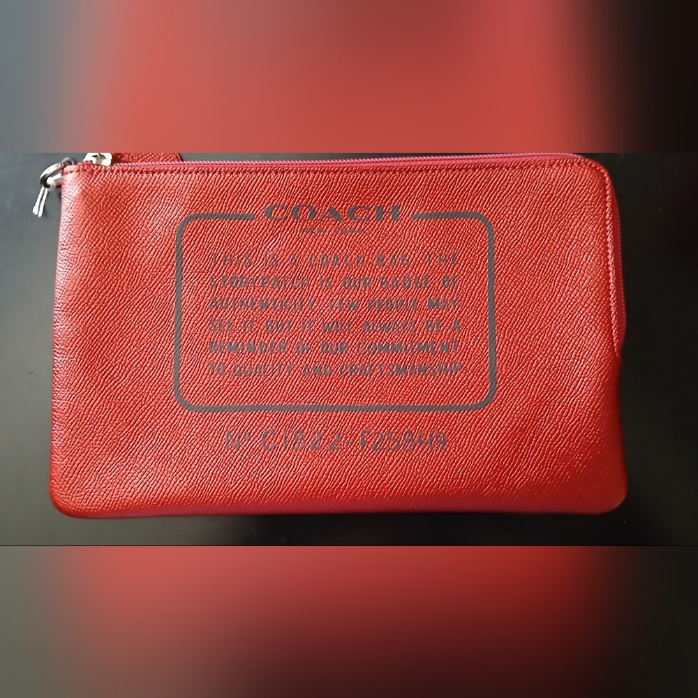 This is A Coach StoryPatch Shiny Red Bag